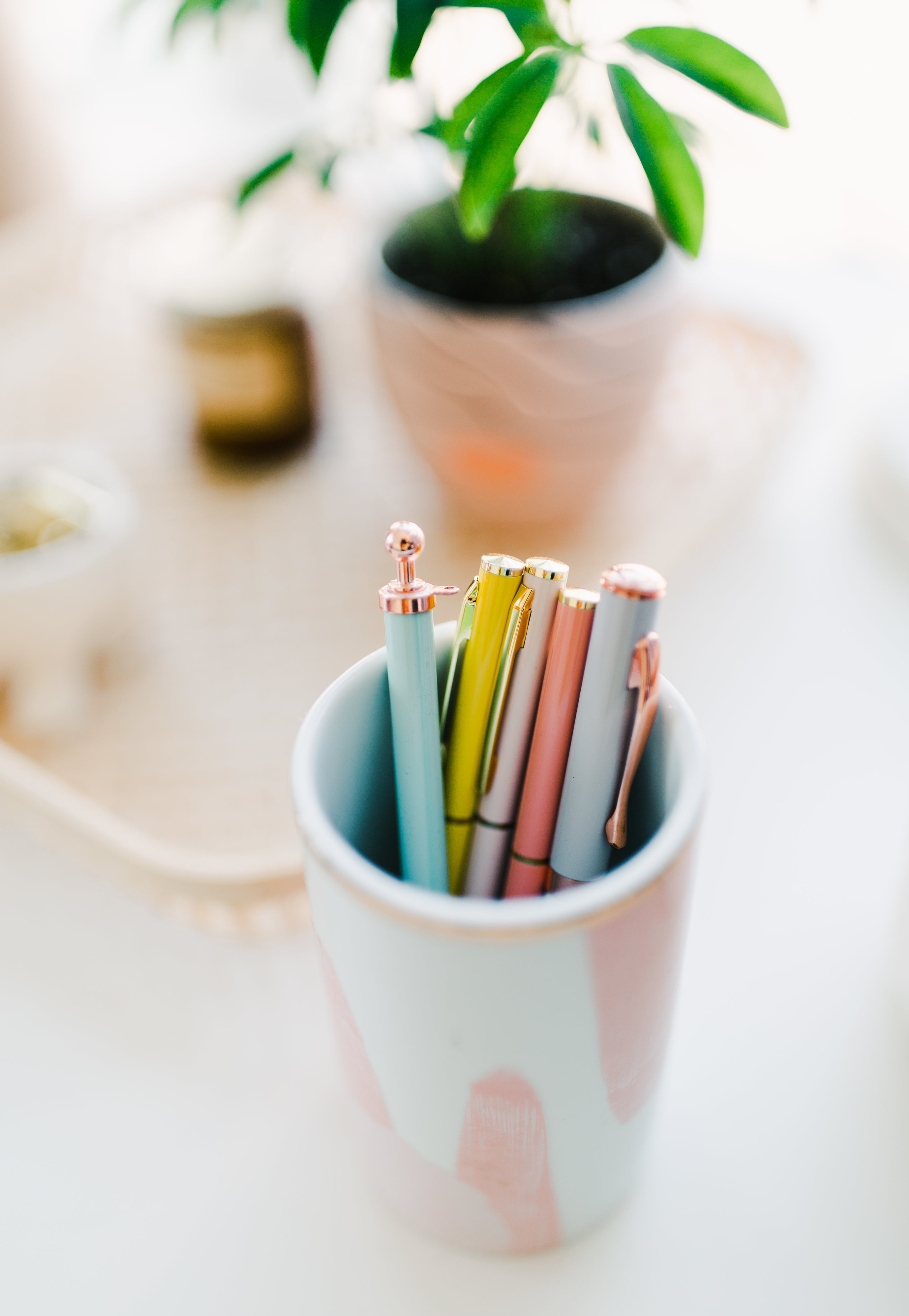 pink-cup-full-of-pens.jpg